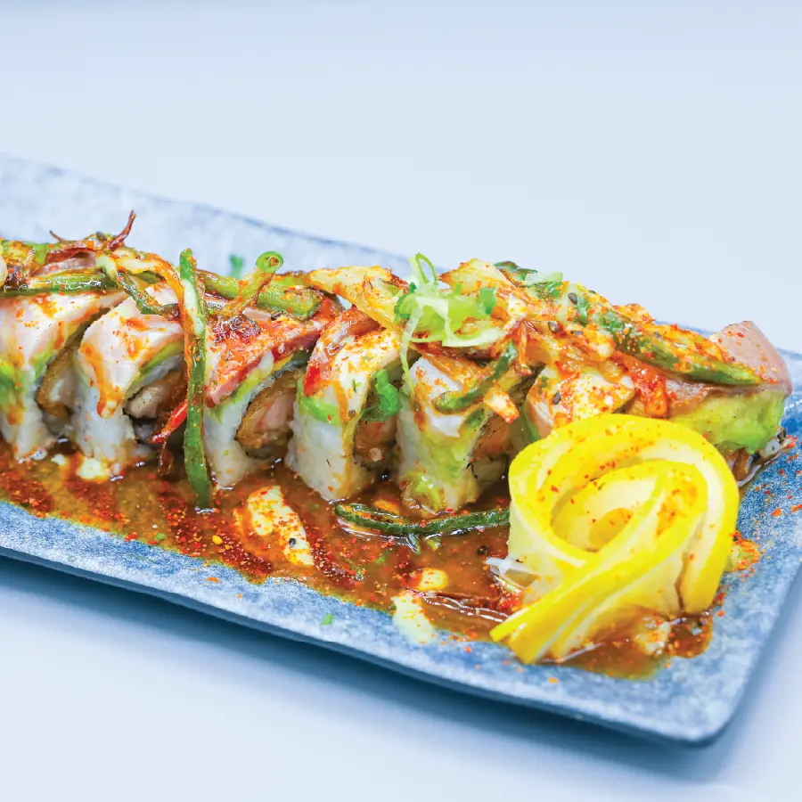 Cream cheese, lemon, tempura shrimp, avocado, torch hamachi, onions and jalapenos.