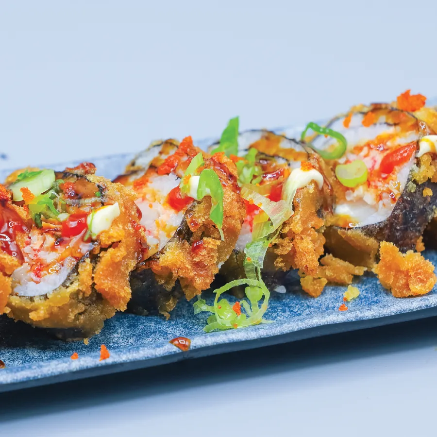 Cream cheese, crab, tempura shrimp and topped with green onions.