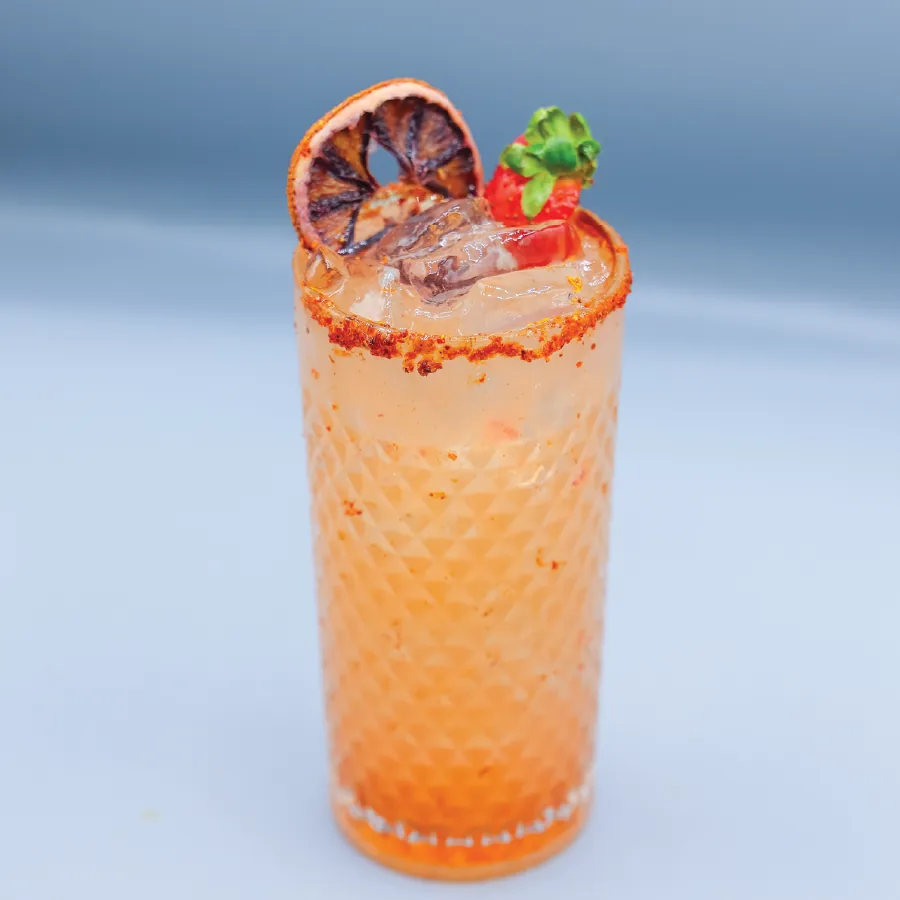La Mala with strawberry and a dehydrated orange.