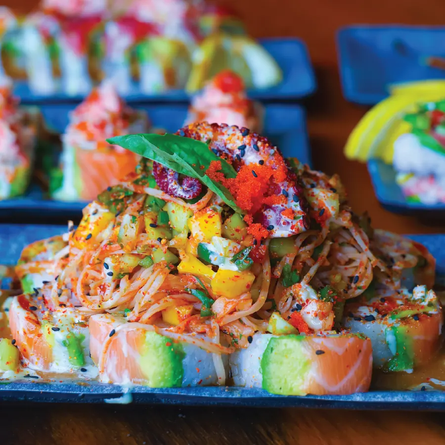 Cream cheese, salmon, crab, ebi, cucumber, jalapeno, cilantro, avocado and mango.