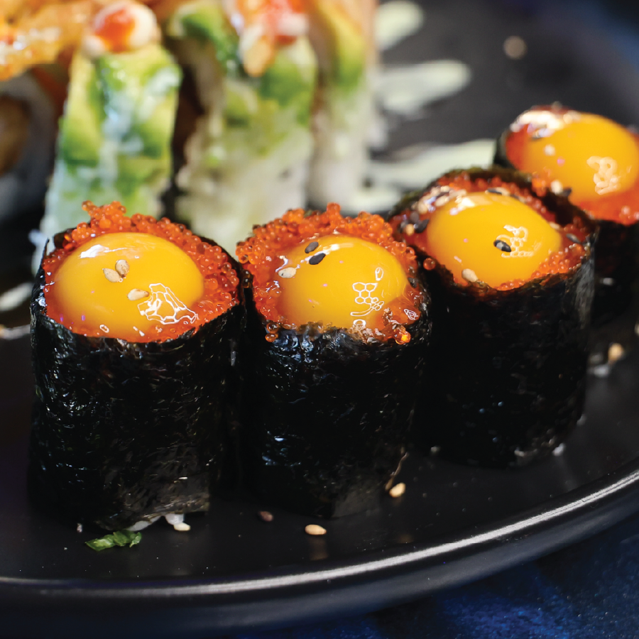 Tobiko topped with quail eggs